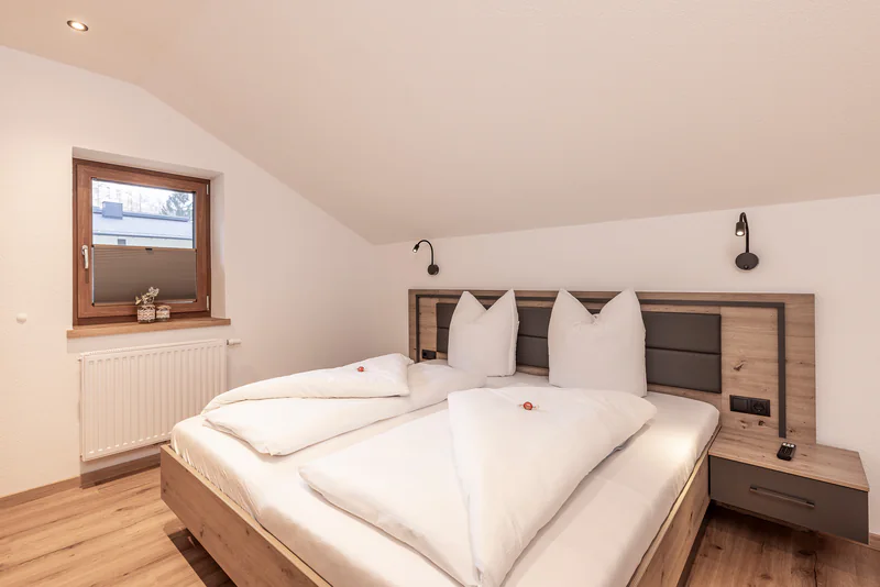 Schlafzimmer unter der Dachschräge